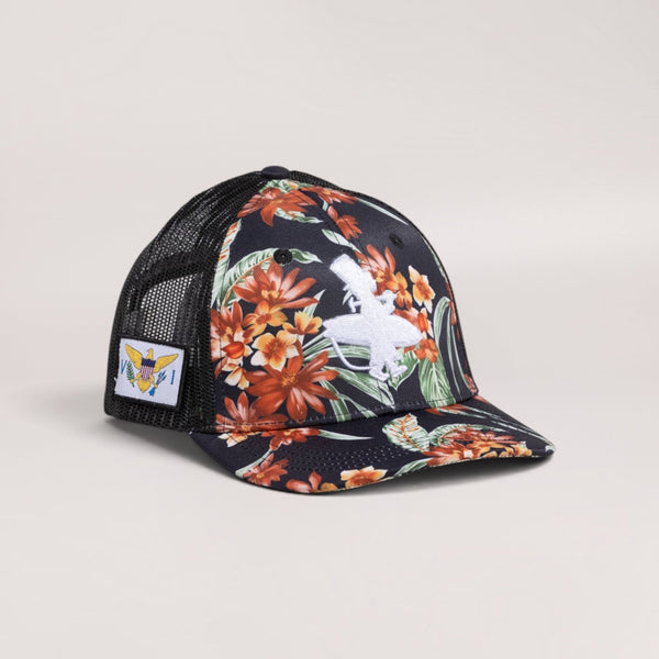 Lost Boy Creations Tarzan snapback hat with tropical floral print, black mesh back, and US Virgin Islands side patch.
