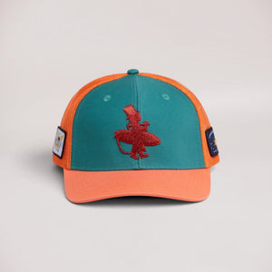 Lost Boy Creations Coral Reefer snapback hat with teal front, orange brim, mesh back, and red embroidered logo.