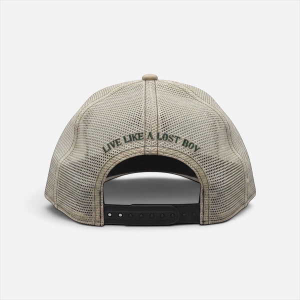 Back view of Lost Boy Creations Forest Sand Dunes trucker hat with white mesh, snapback closure, and green embroidery