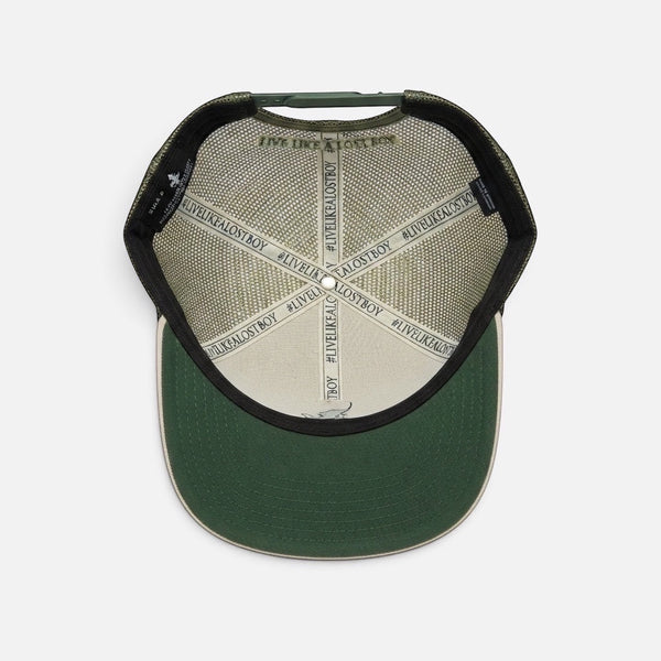 Interior view of Lost Boy Creations Forest Sand Dunes trucker hat showing branded tape and mesh back construction