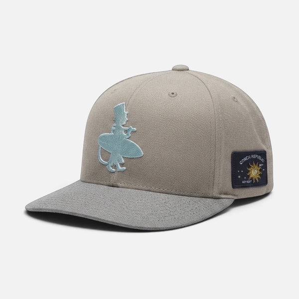 Vanilla Ice Hat in Ivory — front flat lay, metallic blue LBC logo with grey brim and side patch | Lost Boy Creations Key West