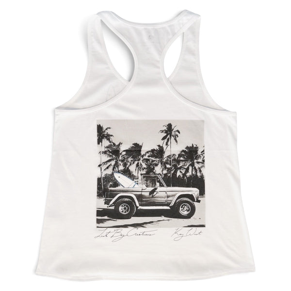 Lost Boy Creations white racerback tank top featuring a vintage Bronco and surfboard graphic on the back