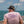 Men's Octopus Tee 2.0 in Purple — on-model back view, man sitting on sailboat wearing octopus graphic tee | Lost Boy Creations Key West