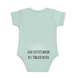 Kid's Lost Boy in Training Onesie in Fern — back view, black "Adventurer in Training" print on green baby bodysuit | Lost Boy Creations Key West